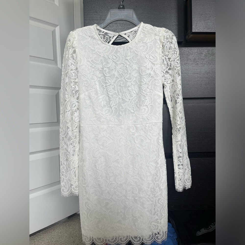 White lace dress from Bella boutique online. Never worn with tags.